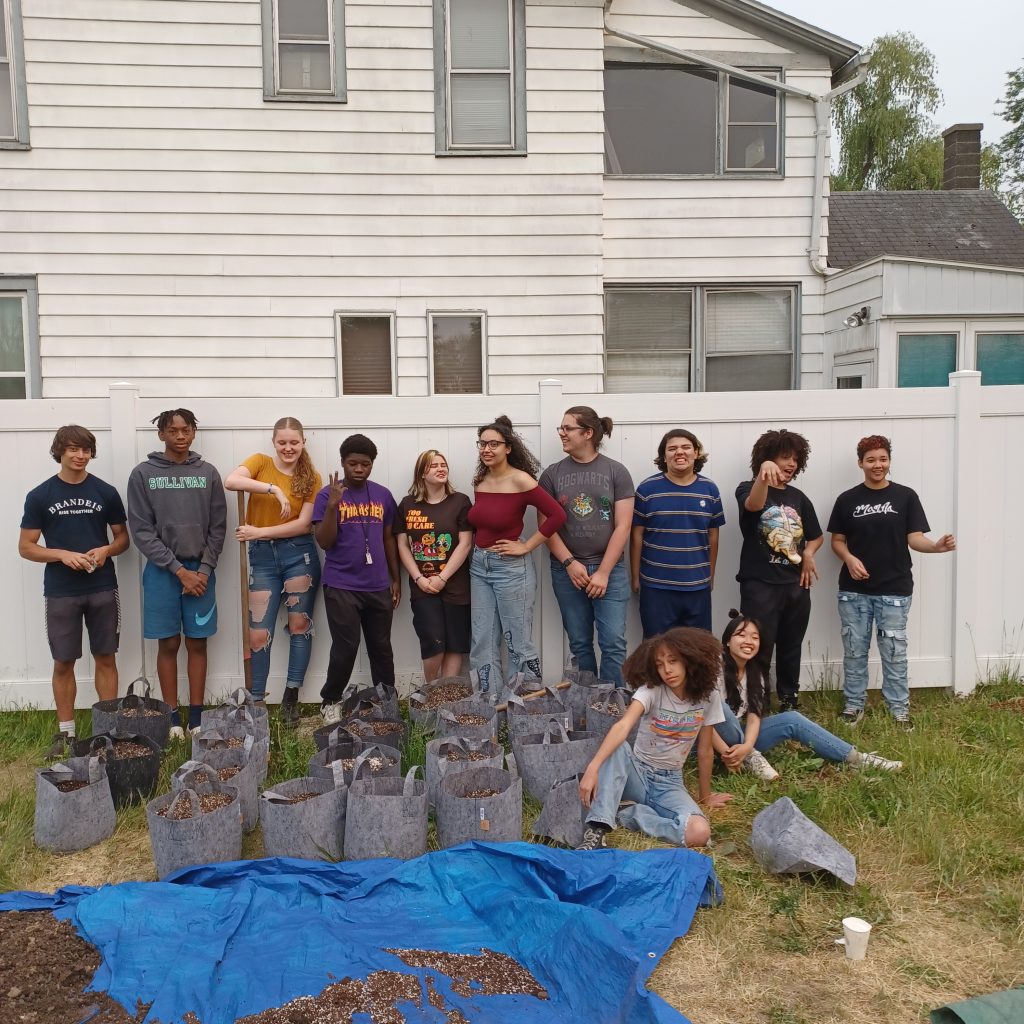 Youth Volunteer Day 2023 where Grow Binghamton Youth led a group of Binghamton High School students in filling grow bags for distribution.